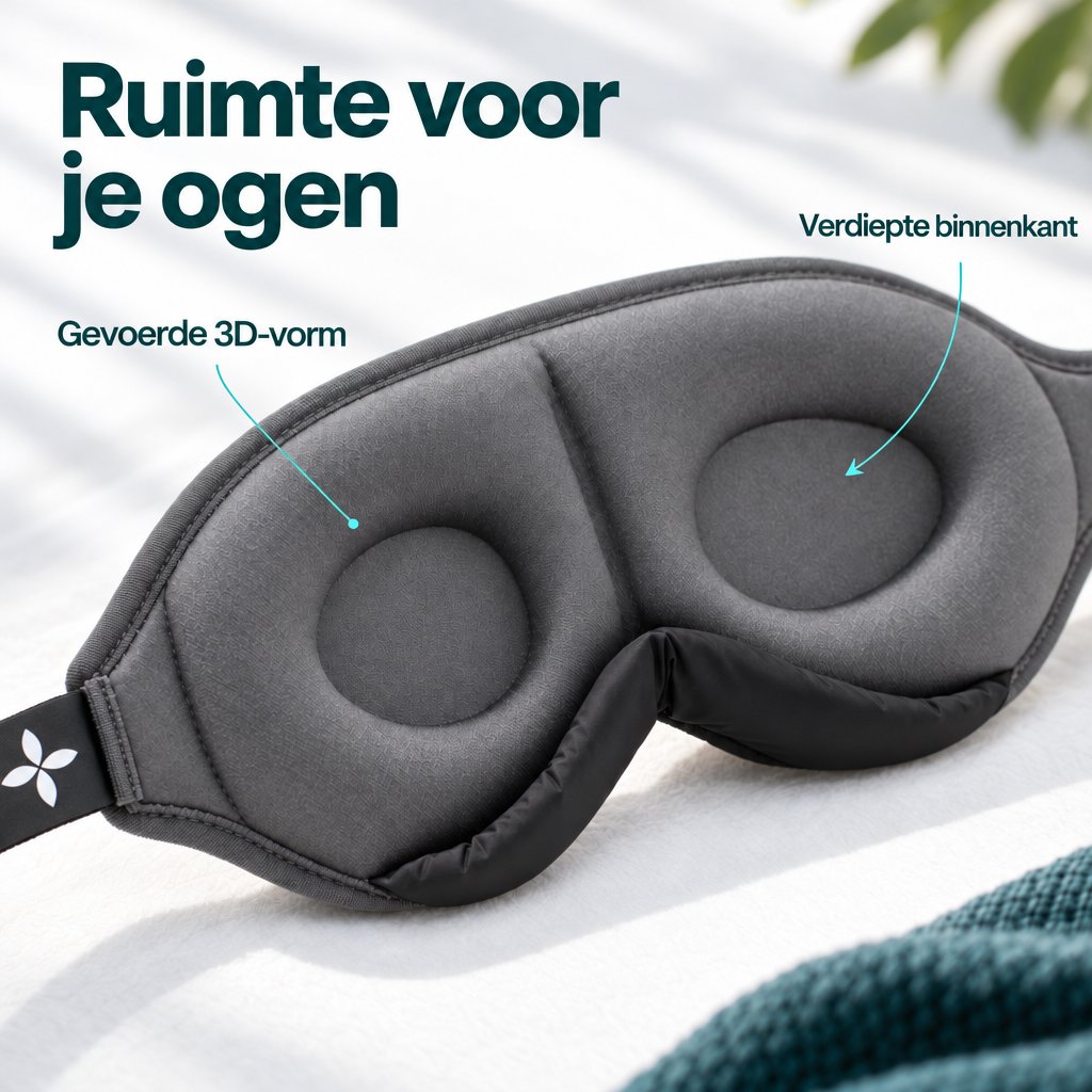Close-up van de binnenkant van het grijze Deluxe-slaapmasker met een gevoerde rand, verdiepte ooguitsparingen en een zwart neusgedeelte.